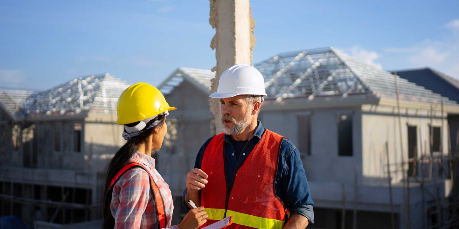 Construction workers on residential building site